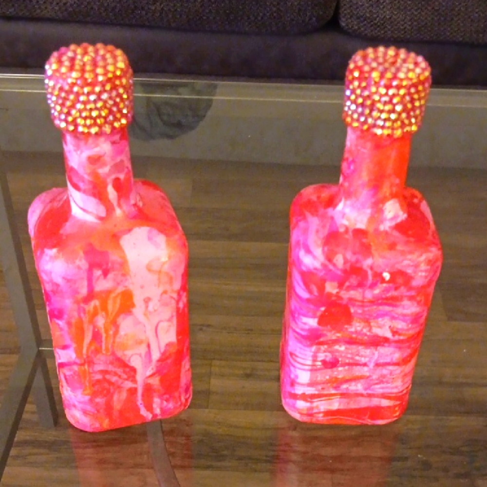 Vibrant Pink and Red Decorative Bottles